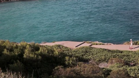 Paths and stairs along the slopes of the rocks along the beach. Spanish beaches Stock Footage 75556193