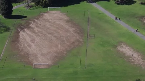 Paths in a park with a soccer field. Stock Footage 41758576