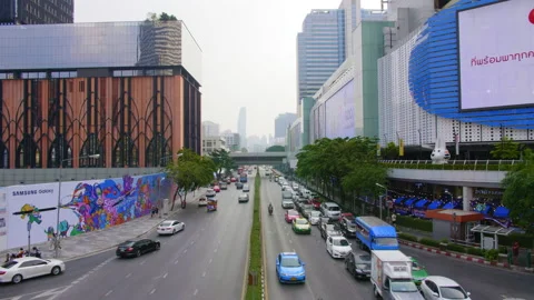 Pathum Wan intersection with traffic, MBK and One Siam, Bangkok Stock Footage 231471532