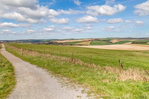A Pathway alongside a Patchwork Landscape Stock Photos