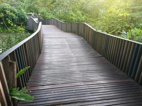 Pathway with bridge in the park Stock Photos