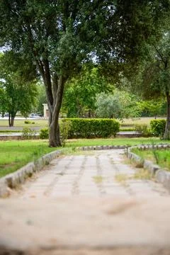 A pathway leads through the park from a rest area on the motorway from Laho.. Stock Photos