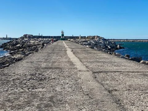 The pathway to the lighthouse Stock Photos