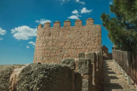 Pathway over old thick wall encircling the town of Avila Stock Photos