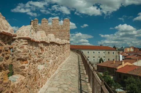 Pathway over old thick wall encircling the town of Avila Stock Photos
