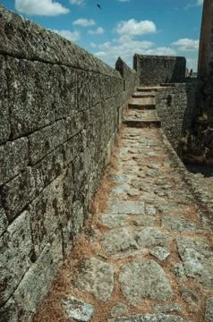 Pathway over thick stone wall in a castle Stock Photos