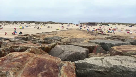 Pathway of rocks on a beach Video stock 138144759