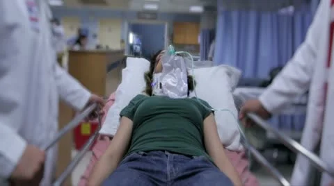 Patient and doctors in hospital Stock Footage