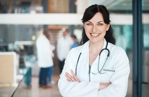 Patient care requires commitment. Portrait of a confident doctor working in a Foto stock