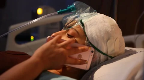 Patient with cell phone Stock Footage 59109746
