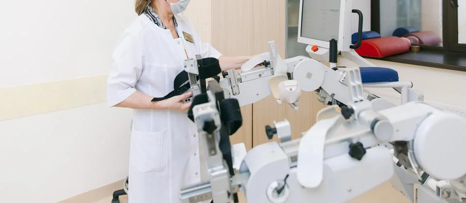 Patient on Continuous Passive Range of Motion machines. Device to provide Stock Photos