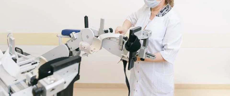 Patient on Continuous Passive Range of Motion machines. Device to provide Stock Photos
