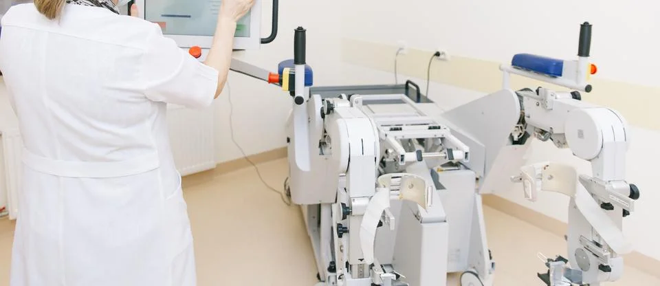 Patient on Continuous Passive Range of Motion machines. Device to provide Stock Photos