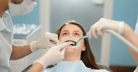 Patient with dental braces during a regular orthodontic visit Stock Footage 147889804