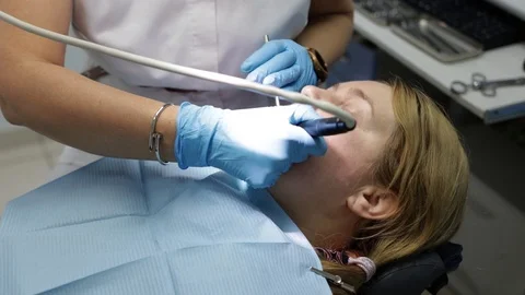 Patient at the dentist1 Stock Footage 123926877