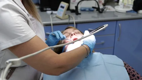 Patient at the dentist2 Stock Footage 123926853