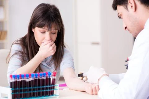 Patient during blood test sampling procedure taken for analysis Foto stock