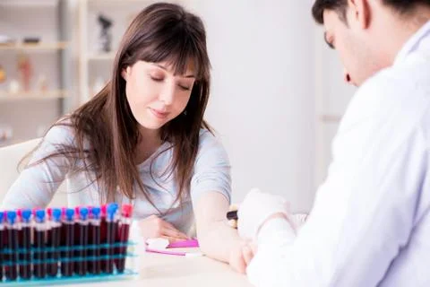 Patient during blood test sampling procedure taken for analysis Foto stock