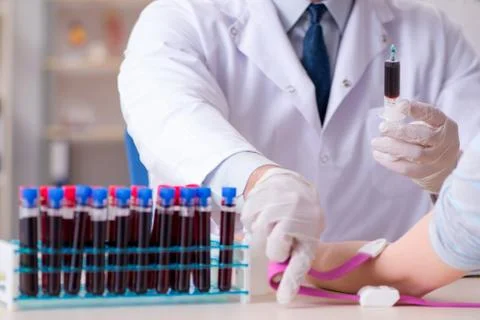 Patient during blood test sampling procedure taken for analysis Foto stock