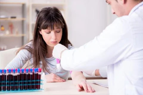Patient during blood test sampling procedure taken for analysis Foto stock