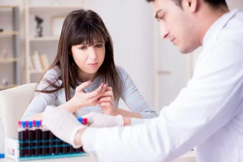 Patient during blood test sampling procedure taken for analysis Foto stock