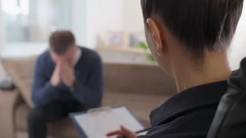 Patient Expressing Distress at Therapy Session Stock Footage 308510870