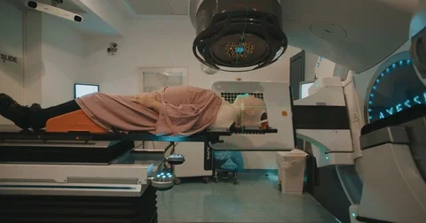 Patient getting Radiation Therapy Treatment inside a modern radiotherapy room Stock Footage