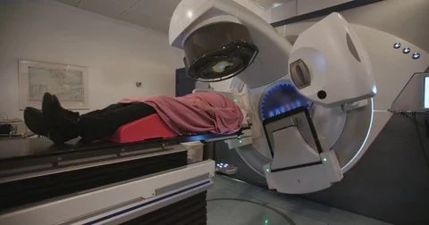 Patient getting Radiation Therapy Treatment in a radiotherapy room Stock Footage