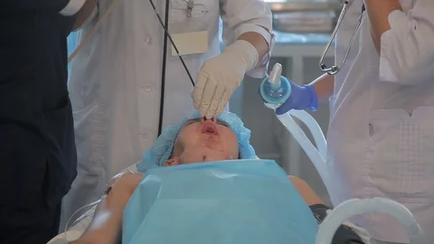 Patient is getting  a stomach pump before operation. Stock Footage 99192469