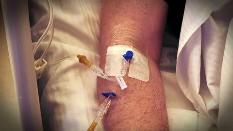 Patient hand with dropper Stock Footage 109493777