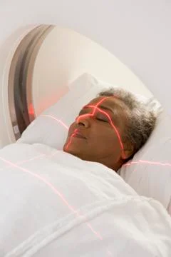Patient Having A Computerized Axial Tomography (CAT) Scan Stock Photos