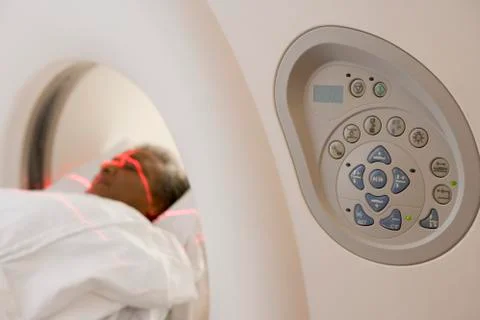 Patient Having A Computerized Axial Tomography (CAT) Scan 스톡 사진