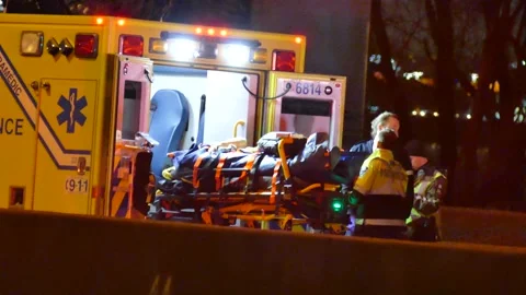 Patient loaded in ambo Stock Footage 139664123