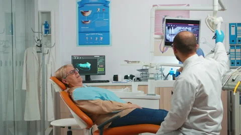 Patient lying in chair at the dentist looking in the mirror Video stock 142014464