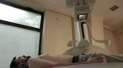 Patient lying on scanner. Mri scan. Radiological examination of the patient. Stock Footage 51631497