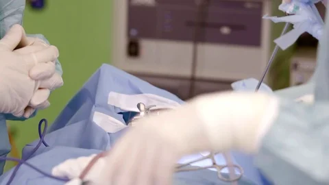 Patient is lying on table during plastic operation. Video stock 83406476