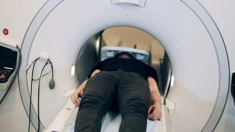 Patient is moving out of the MRI scanner Stock Footage 147014633