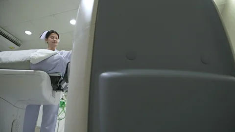 Patient in MRI machine for a CT scan. Stock Footage 92347383