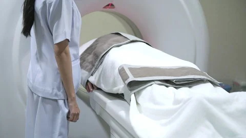 Patient in MRI machine for a CT scan. Stock Footage