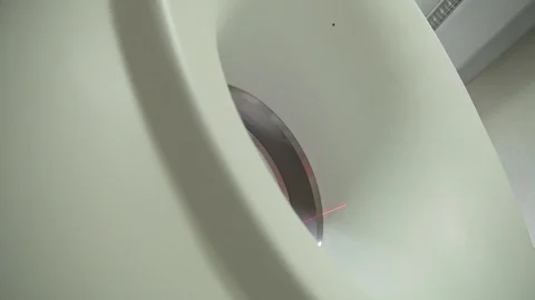 Patient in MRI machine for a CT scan. Stock Footage 92358386