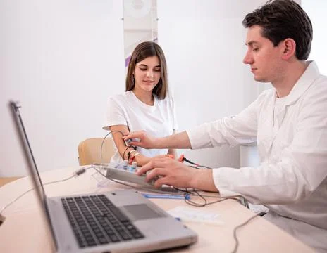 Patient nerves testing using electromyography at medical center 스톡 사진