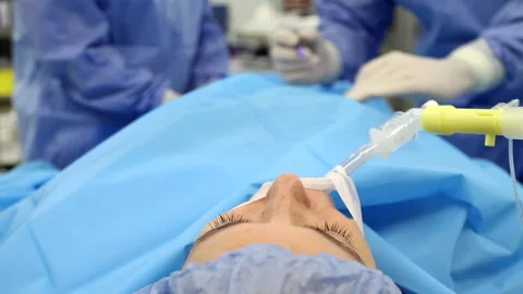 Patient in operating room Stock Footage 239363153