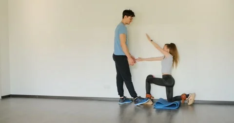The patient performs exercises under the supervision of a doctor Video stock 264027075