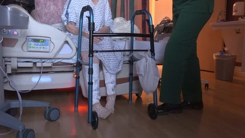 Patient prepares to begin physical therapy Stock Footage 73434977