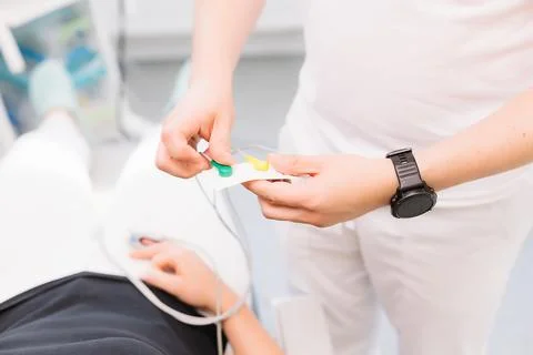 Patient with pulse and oxygen sensor at dentist's appointment. Anesthesiology Stock Photos