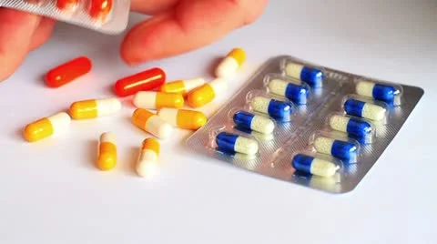 Patient Puts the Pill on the Table. Video stock 20586416