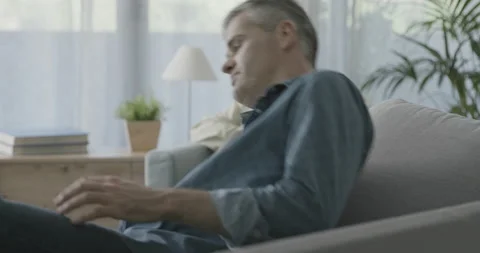 Patient sitting on the couch during a therapy session Stock Footage 162356063