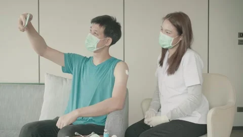 Patient Taking a Selfie with Nurse While Wearing Masks Stock Footage 316073466
