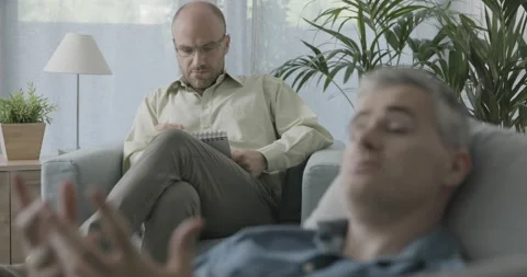 Patient talking to his therapist Stock Footage 162355559