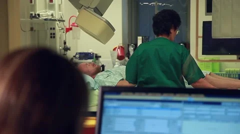Patient under angiography machine Video stock 41555523